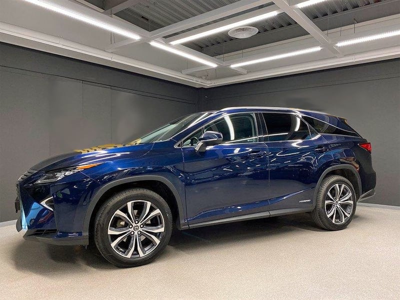 Blå metallic Lexus RX 450H L AWD stulen i Hässelby västra Stockholm